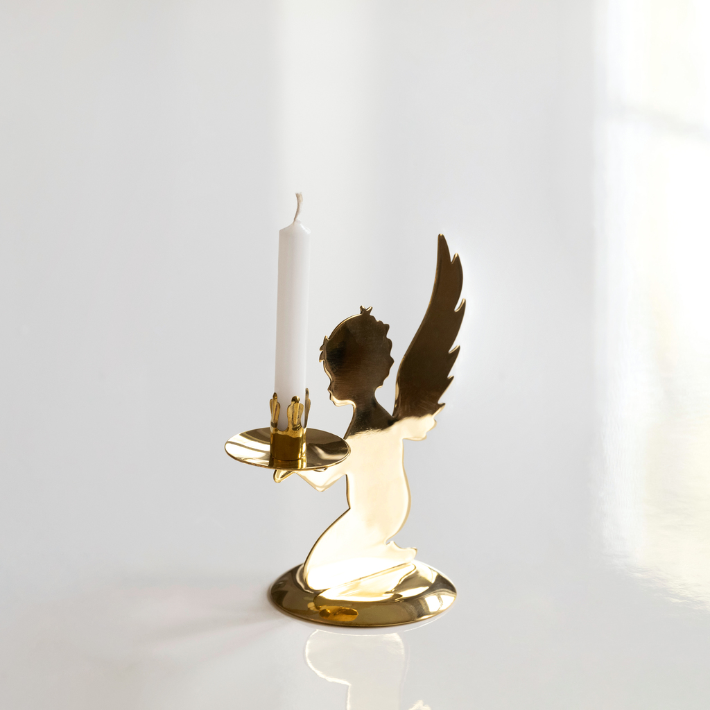 Kerzenleuchter aus Messing Putto Kerzenleuchter aus Messing Putto